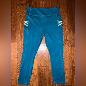 Dark teal with light yellow accents, Fabletics, motion 365, capri leggings